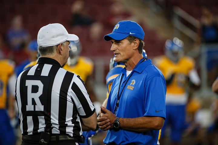 130907-Stanford-SanJose-025.JPG - Sept.7, 2013; Stanford, CA, USA; San Jose State Spartans head coach Ron Caragher (right) talks to referee Michael Batlan priorto game against the Stanford Cardinal at  Stanford Stadium. Stanford defeated San Jose State 34-13.